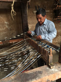 preparing the loom for the weaving of the Big Lebowski pants