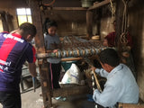 preparing the loom for the weaving of the Big Lebowski pants