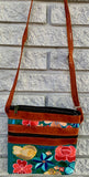 Leather and textile purse