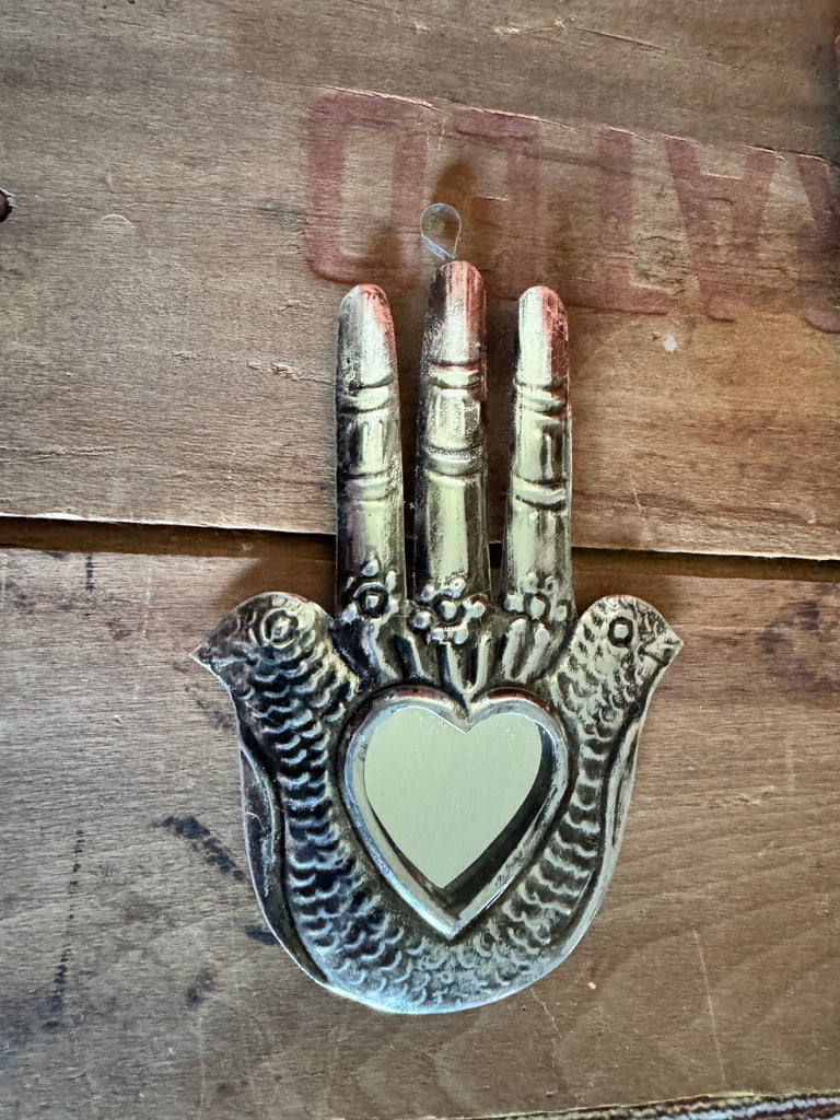 Hamsa with heart and mirror