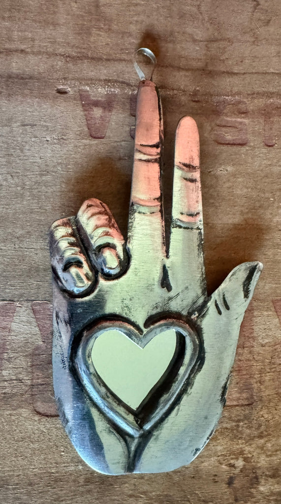 Hand with heart and mirror 2